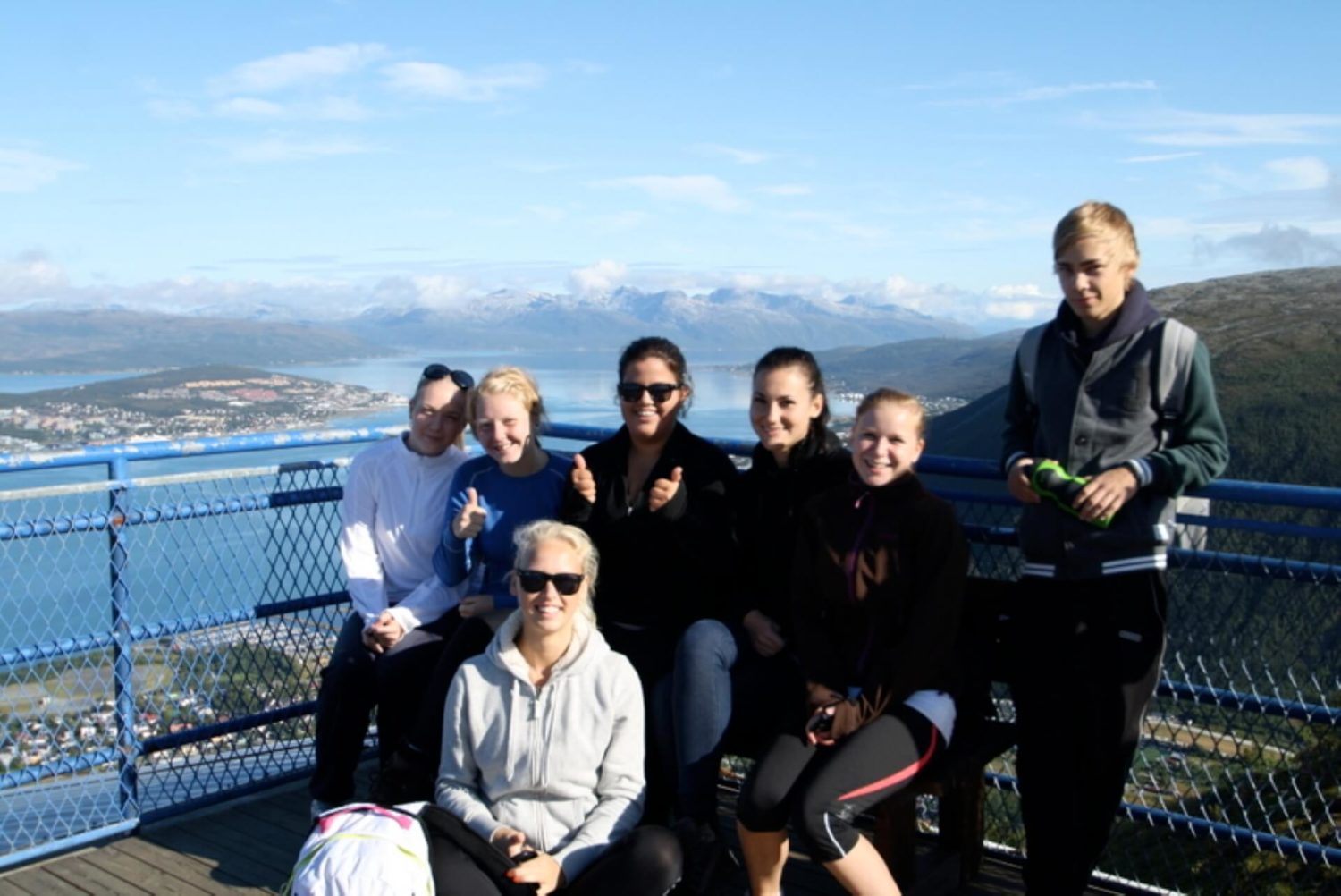 norway Exchange student with her Norwegian friends on a scenery vieweing place